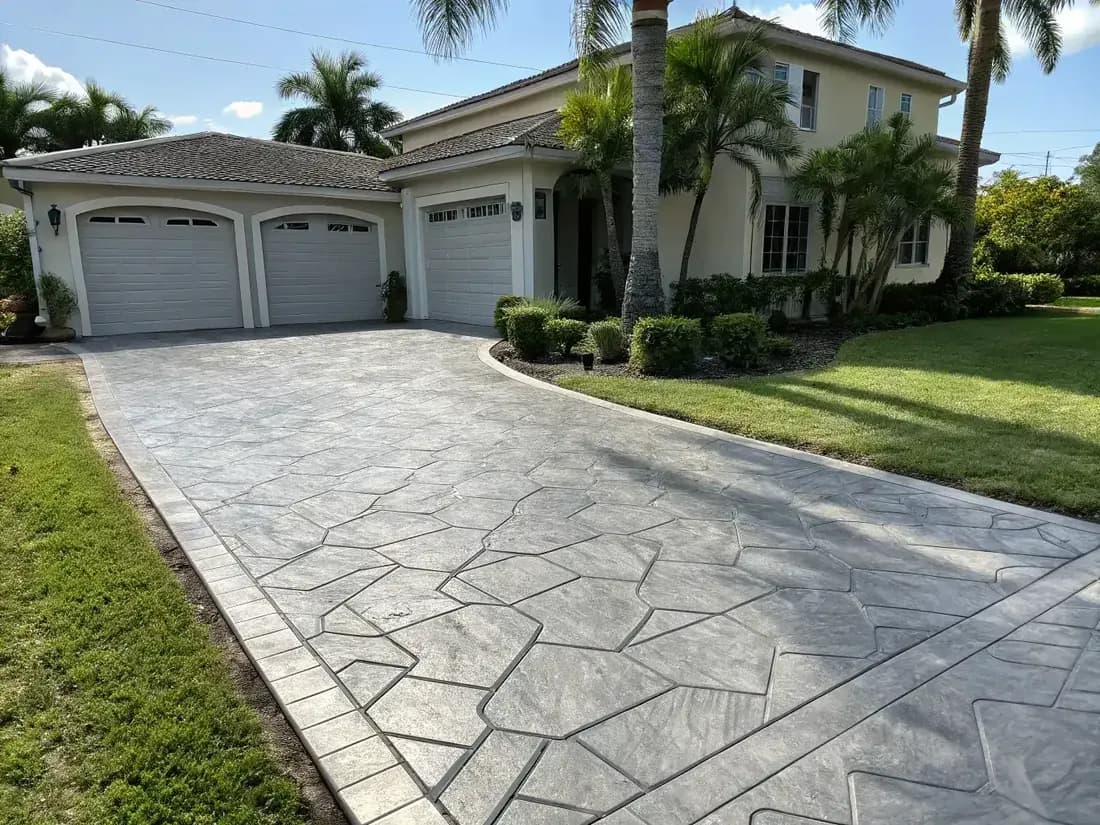 Premium gray stamped concrete with geometric flagstone pattern — Naples, FL